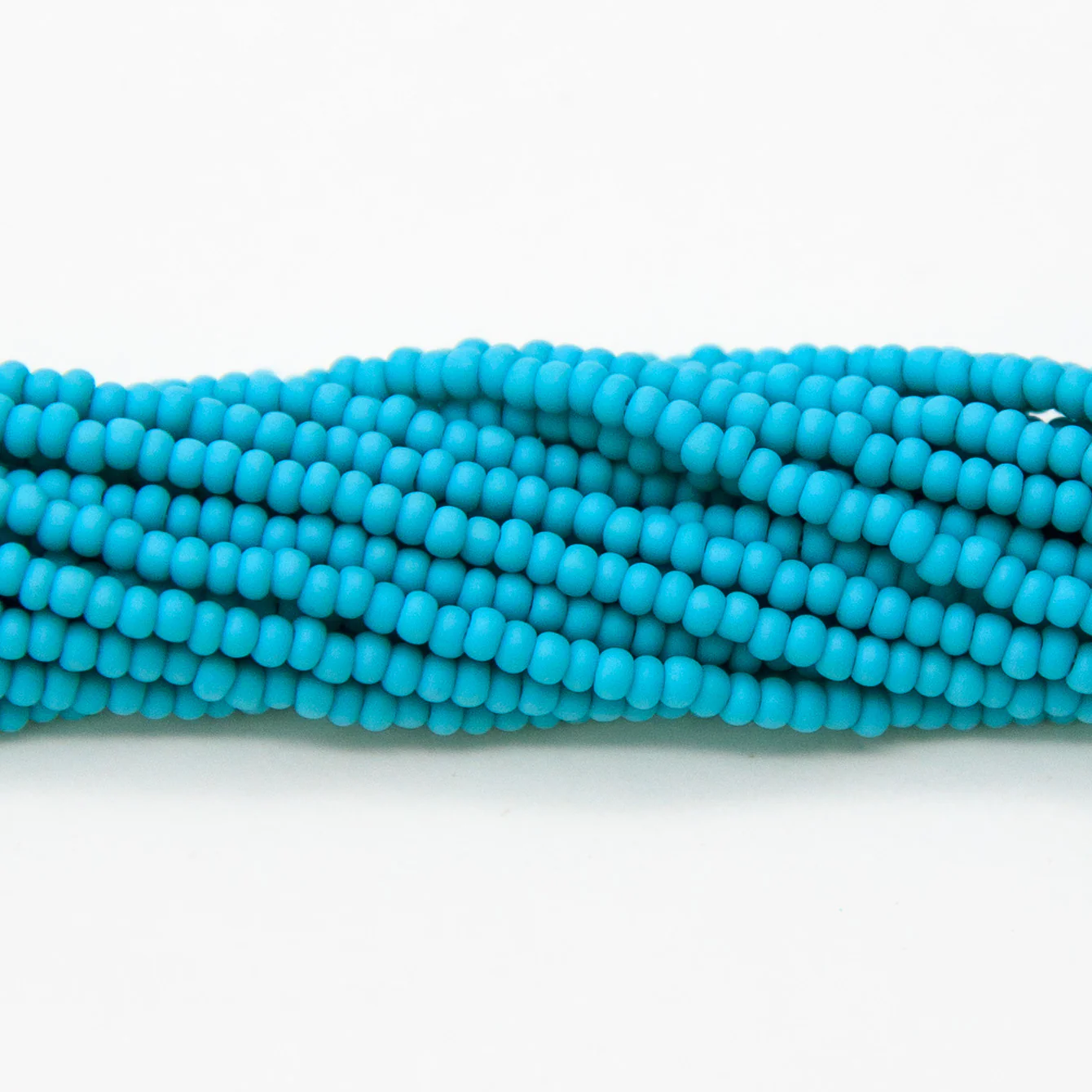 10SB185-MR: Cz Seed Bead Turquoise Matte 10/0 - Image 4
