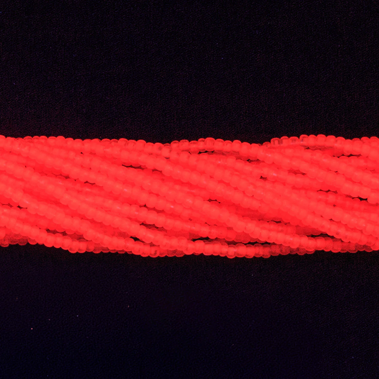 10SB638-NTR: Czech Seed Bead Neon Orange On Crystal 10/0 - 1 Hank - Image 2