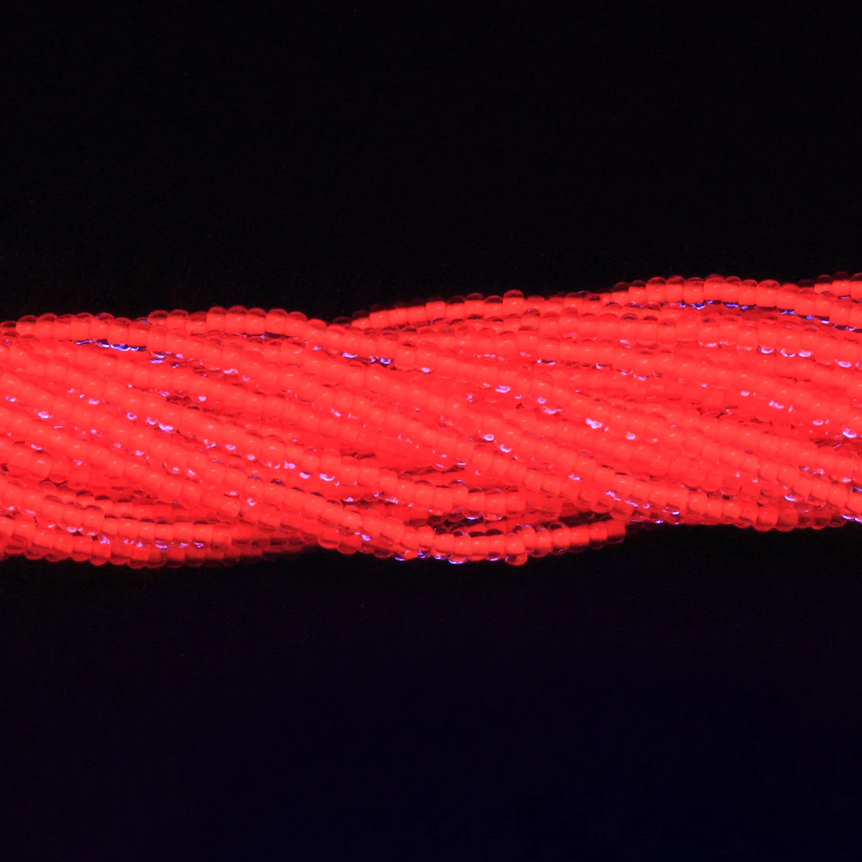 10SB734-N:  CZ Seed Bead Neon Lined Orange Uv Reactive 10/0 -  5HK - Image 2