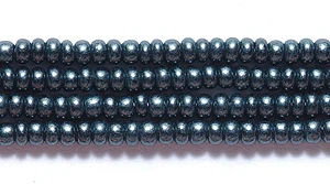 11SB109-87: CZ Seed Bead Coated Pearl Emerald On Jet 11/0 6HK