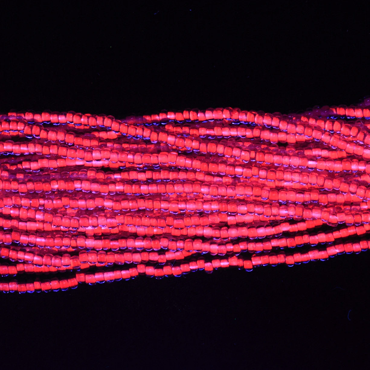 11SB798-NR: CZ Seed Bead Neon Lined Purple 11/0 Uv Reactive-1HK - Image 2