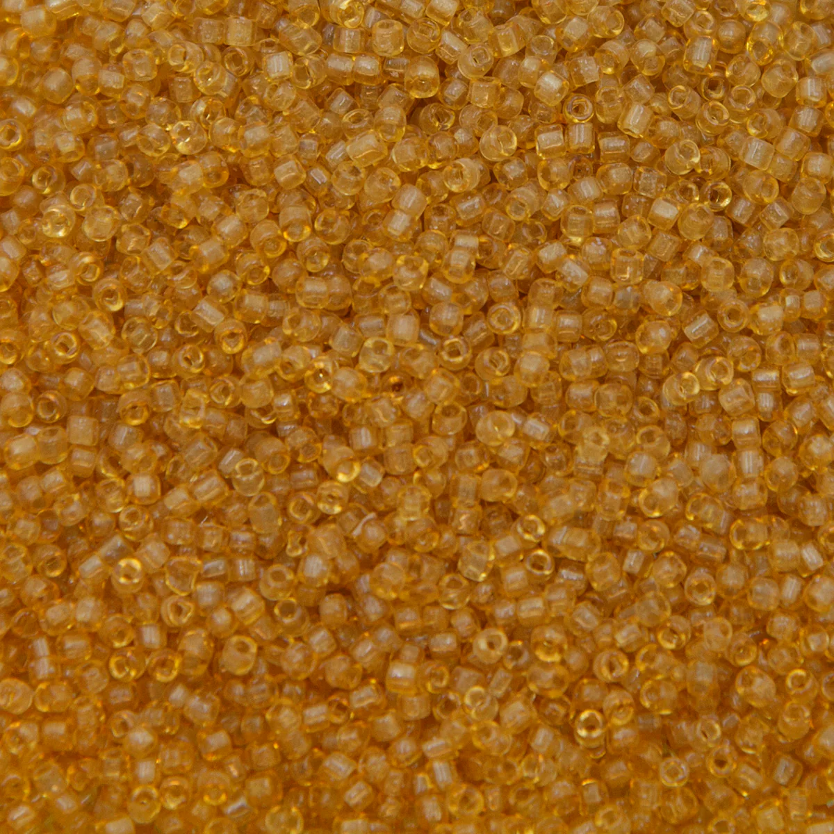 12SV253-7QR: Vin Venetian Seed Bead Trans Gold #7 SQ-HOLE 12/0-50GMs - Image 2