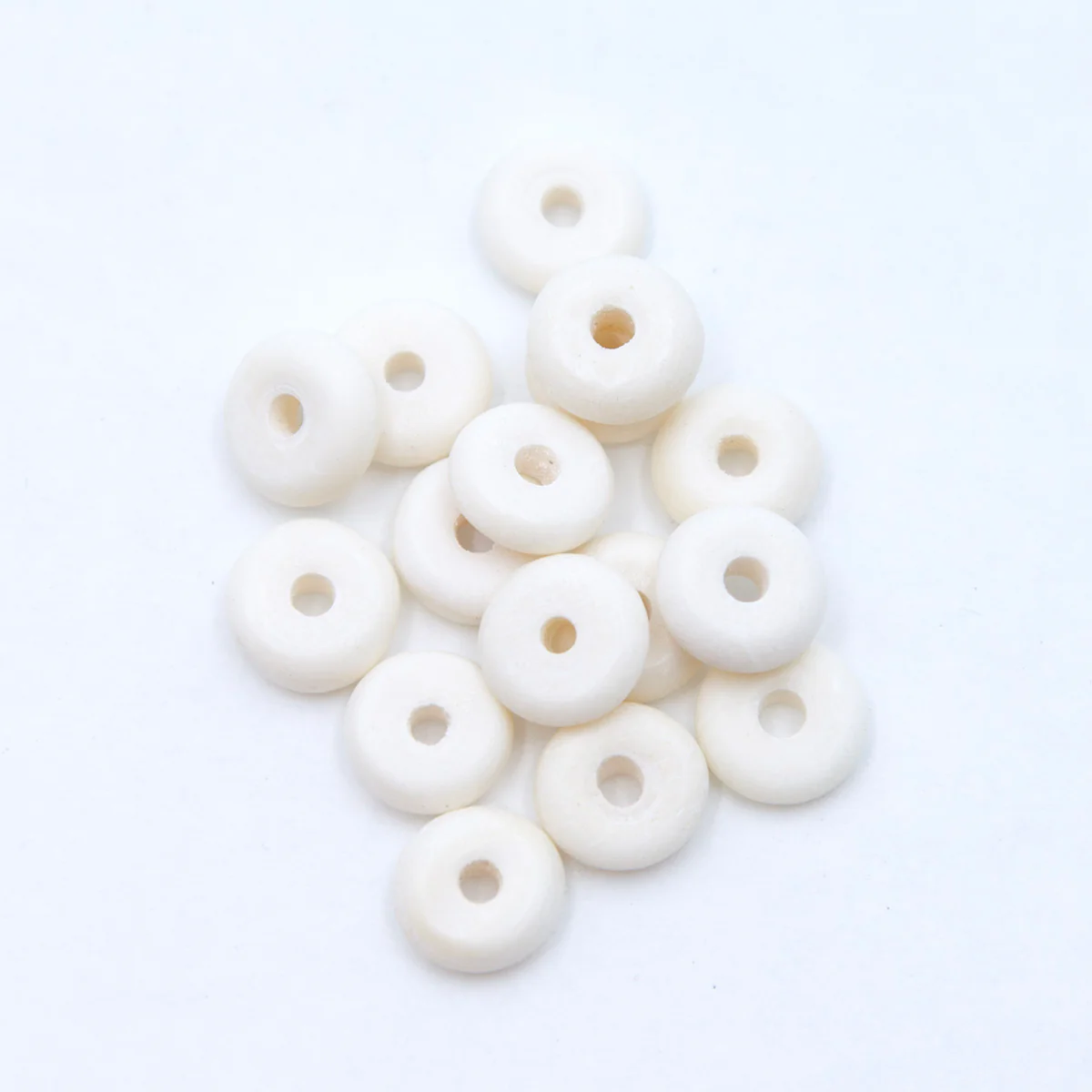 40BN114: Bone Disc White 3x9mm 100 Pieces - Image 2