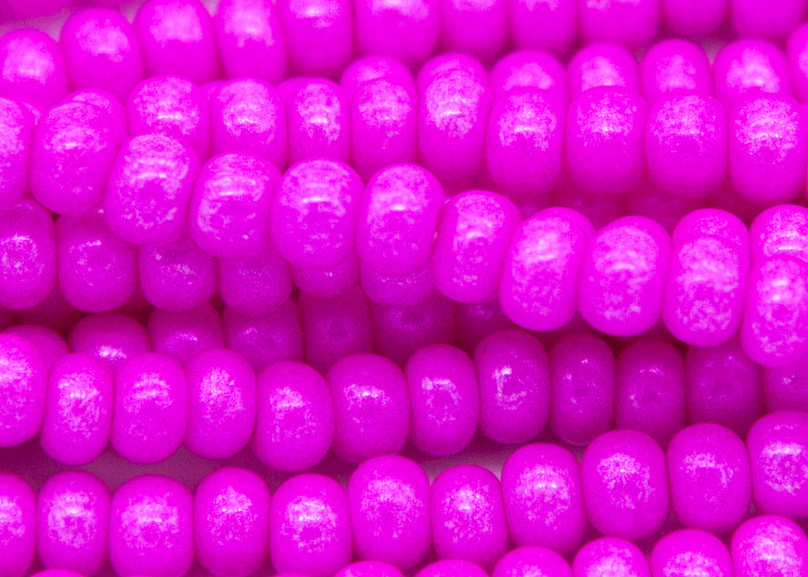 6SB396-DY: CZ Seed Bead Sfinx Coated Bright Pink 6/0 36STR