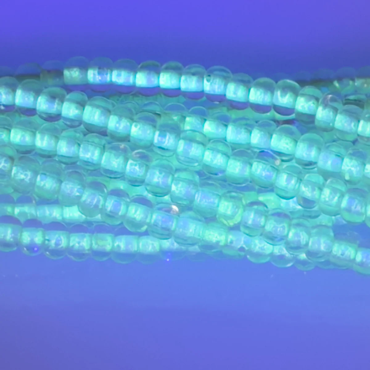 6SB712-NGR: CZ Seed Bead Colorlined Glow In The Dark 6/0-6STR - Image 2