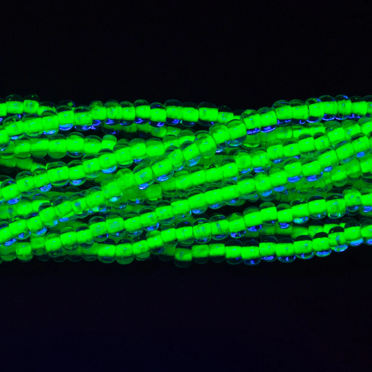6SB784-N: CZ Seed Bead Neon Lined Green 6/0 Uv Reactive 36STR - Image 2