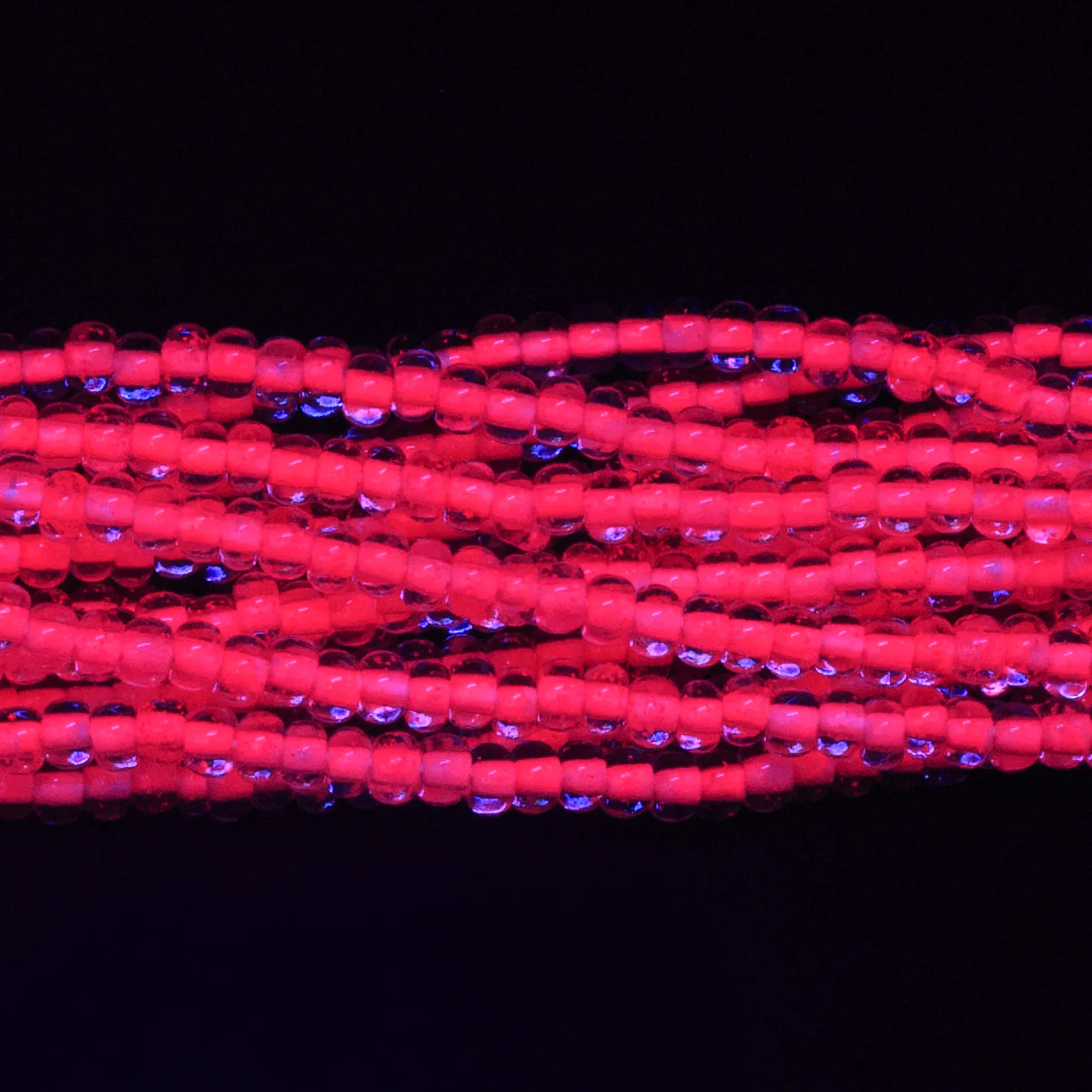 6SB793-N: CZ Seed Bead Neon Lined Pink 6/0 Uv Reactive 36STR - Image 2