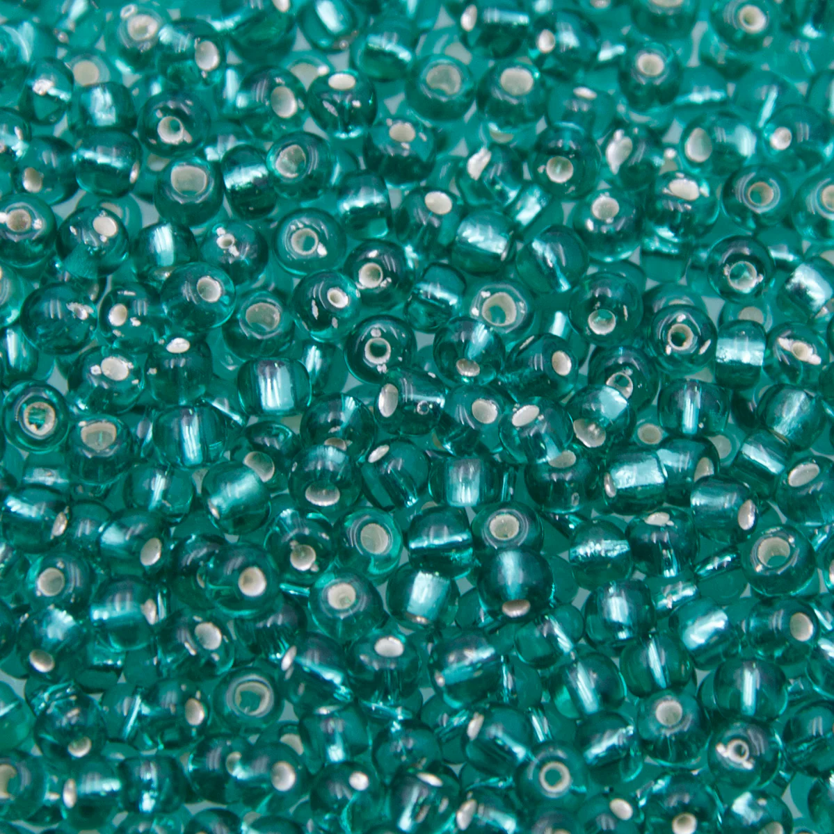 SV100-94: Vintage Venetian Seed Bead Silverlined Emerald 5/0 - 250 Grams